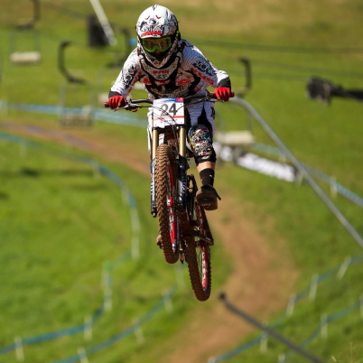 Melissa Buhl airborne on a World Cup downhill course